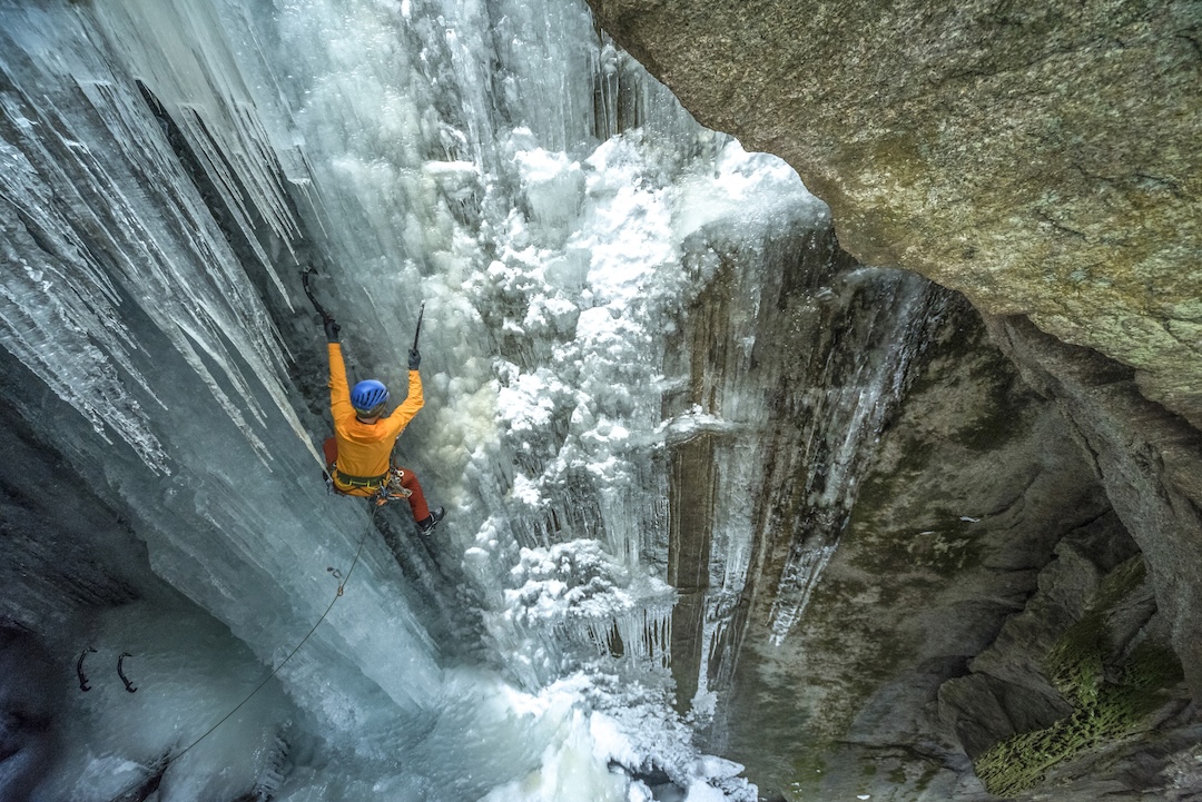 Guided ice climbing action